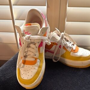 Nike Women's Vibrant Yellow and Pink Sneakers